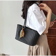 Emma. Borsa shopper intrecciata in paglia